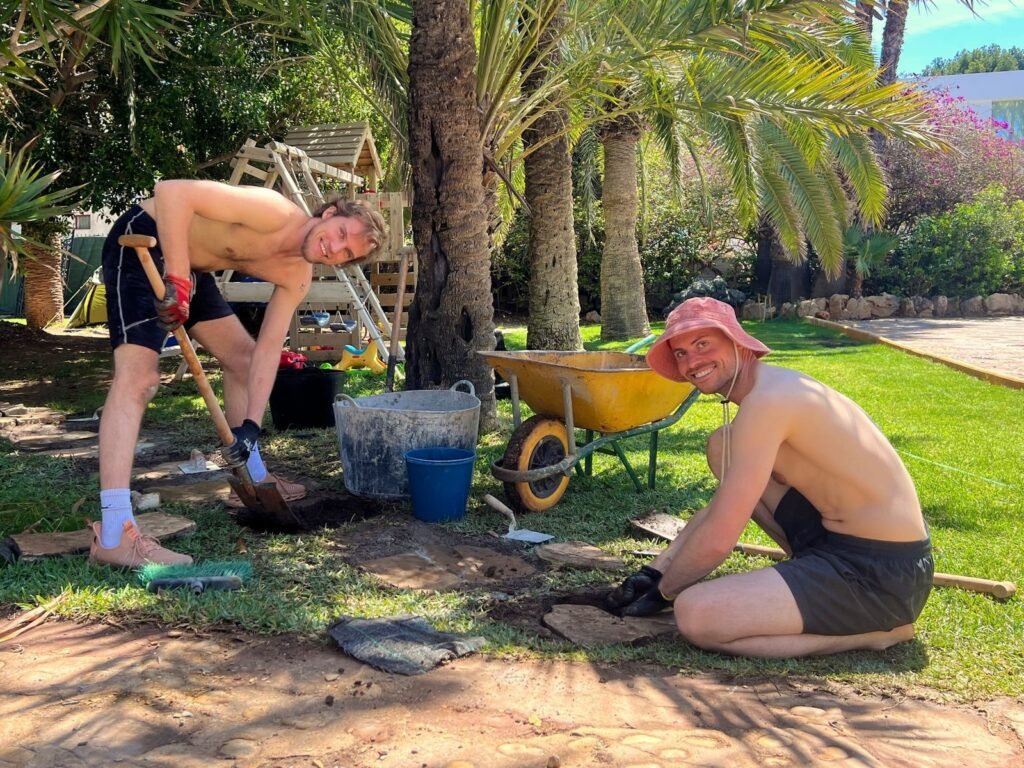 Karma Yoga and spiritual volunteering in the Mediterranean garden of a wellness retreat in Denia, Spain.